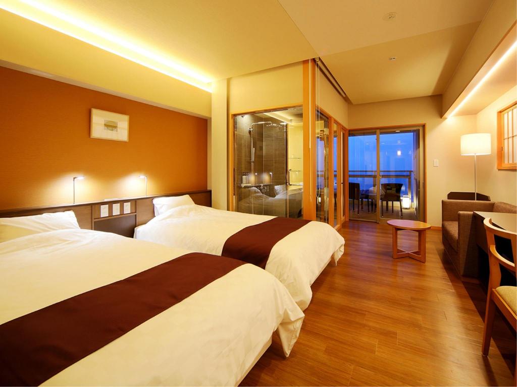 Beds or bedding in a real guestroom at Kaike Yugetsu