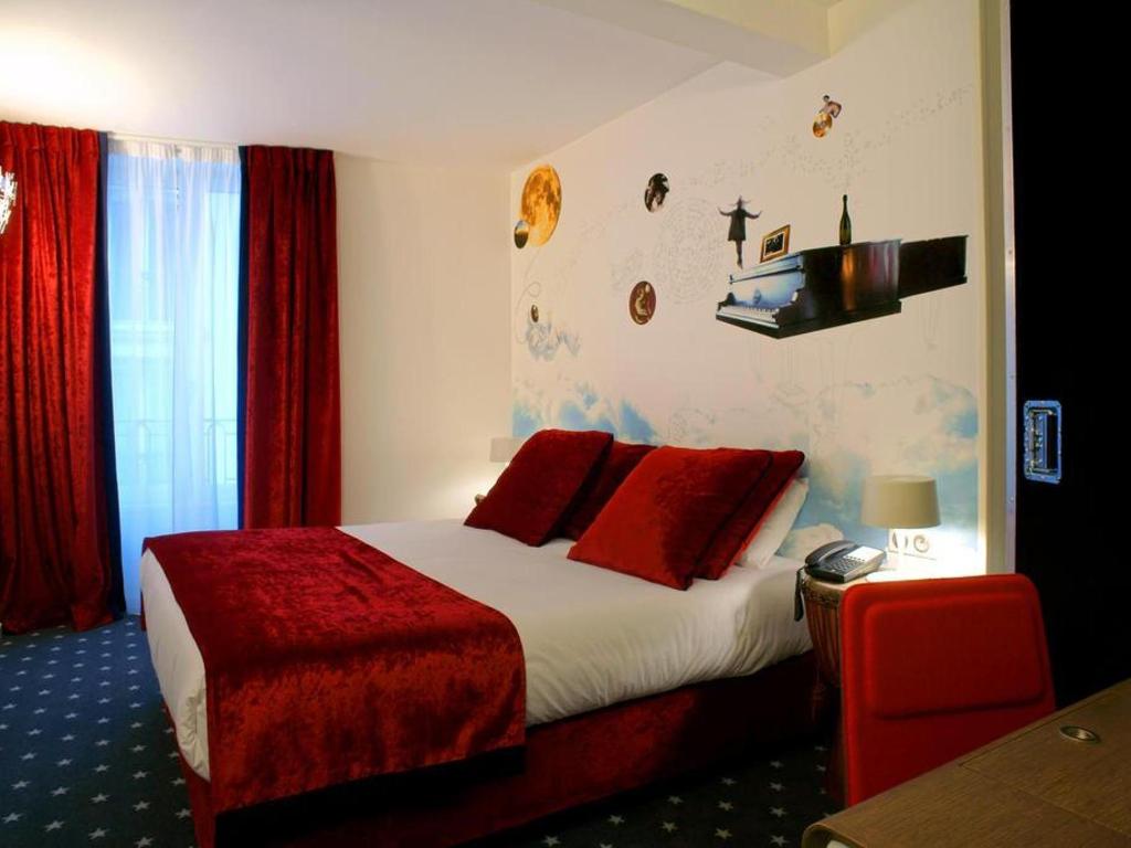 Hotel du Triangle d'Or 객실 내부 예시