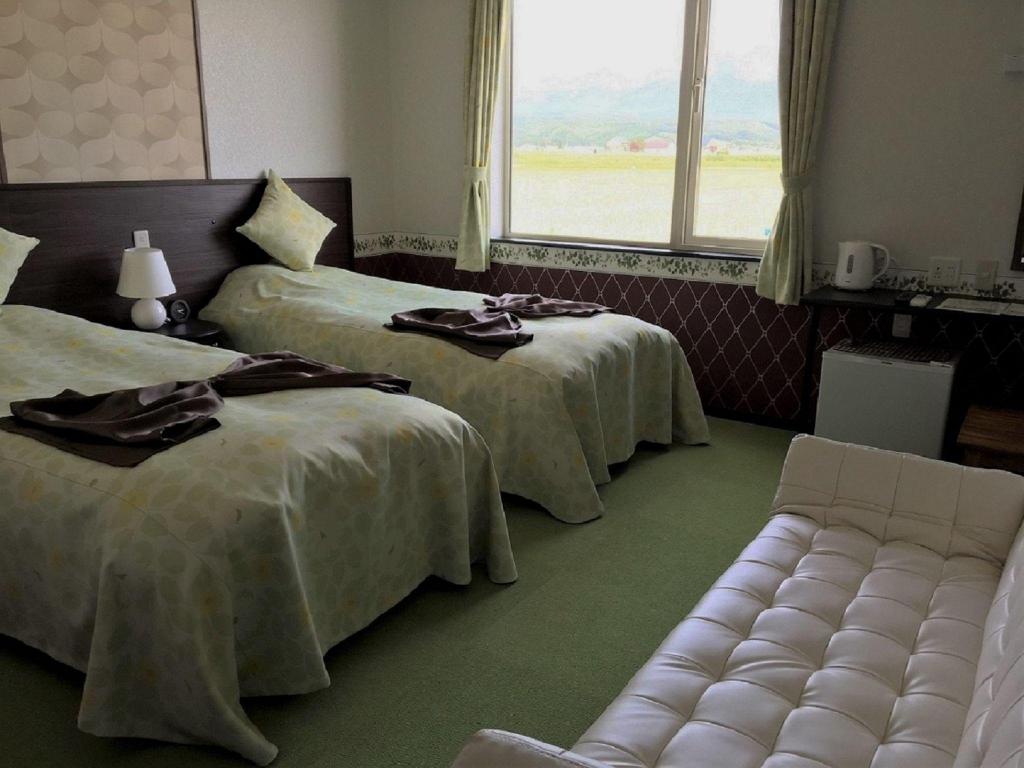 Petit Hotel Blanc Fleur 객실 내부 예시