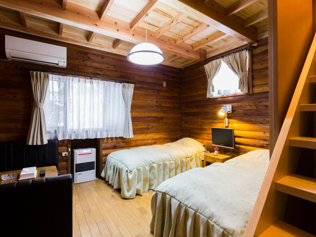 Cottage Inn Log-cabin 객실 내부 예시