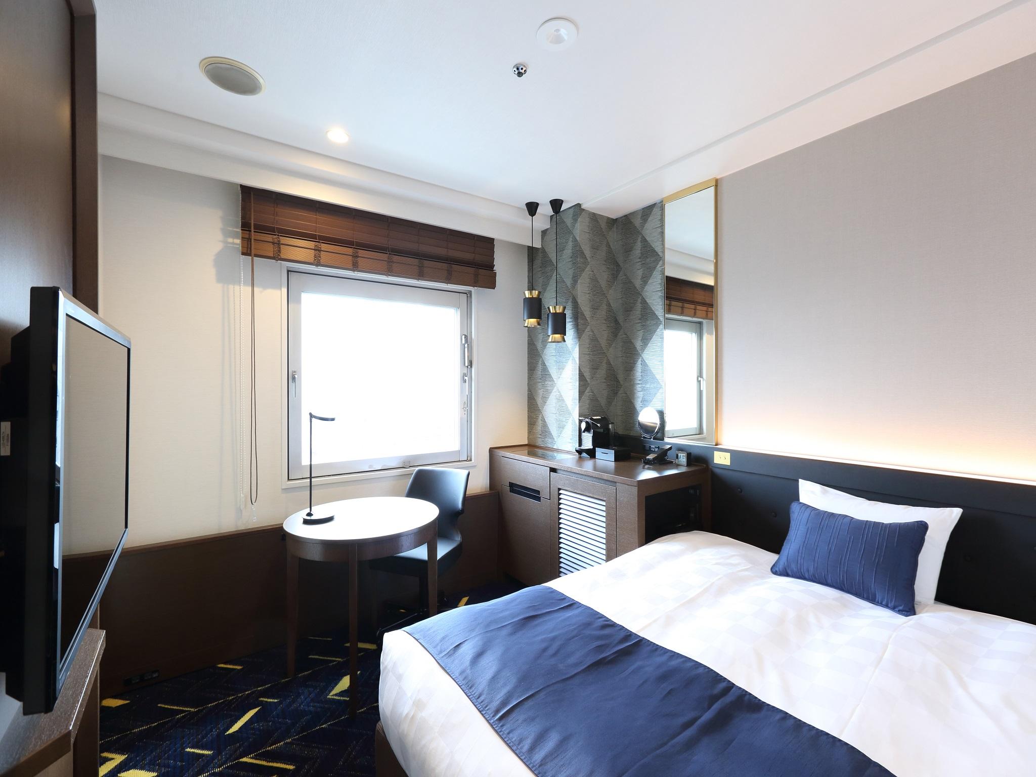 Kobe Sannomiya Tokyu REI Hotel supplier room and living-space example