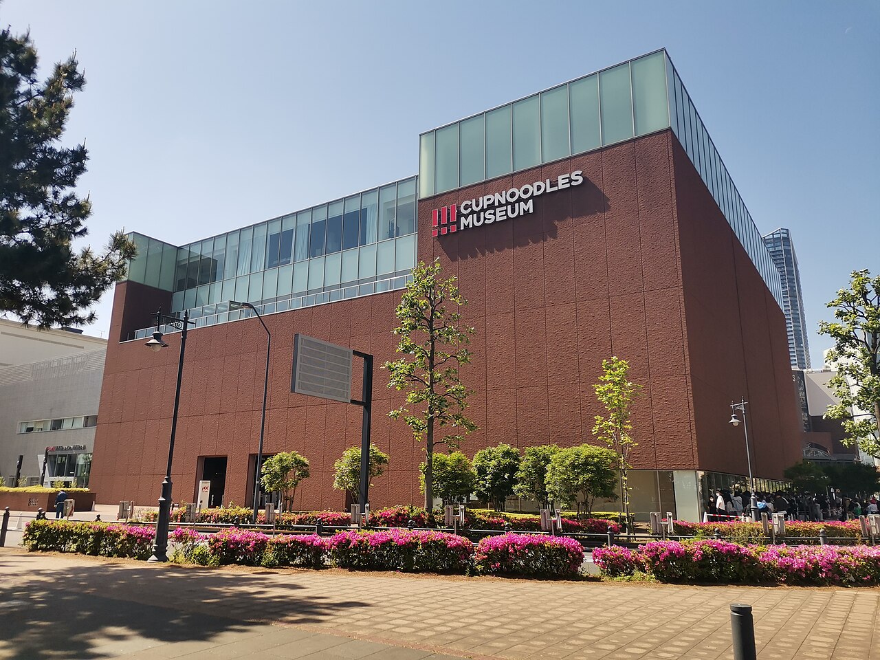 Red exterior and entrance of the Cupnoodles Museum in Yokohama
