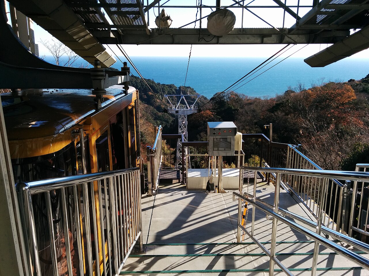 Historic Nihondaira Ropeway cabin, boarding platform and cables toward the sea